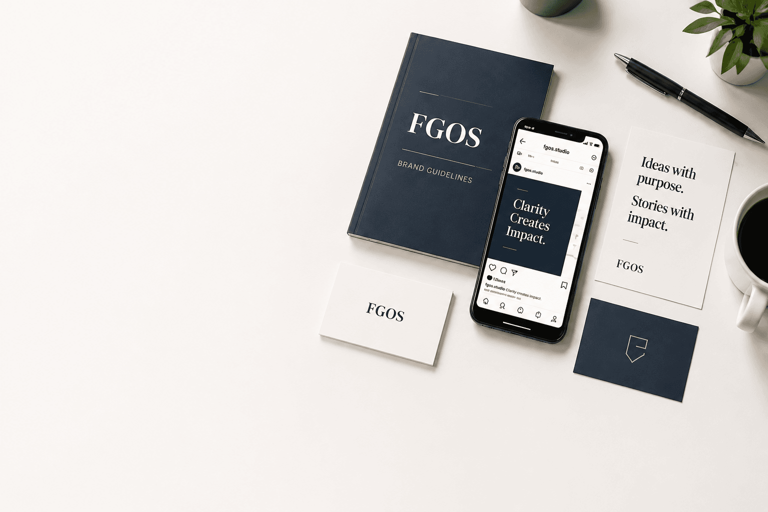 Flat lay of brand identity materials, digital media, notebook, and coffee